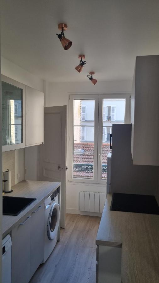 Appartement Luxueux Dans Maison Bourgeoise Parisienne Levallois-Perret Exterior foto